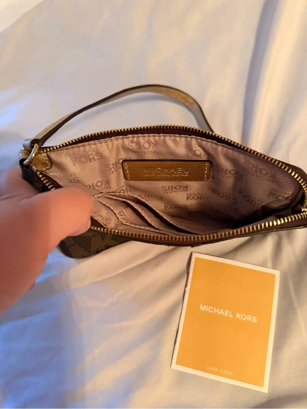 Michael Kors Brown and Gold Signature Wristlet